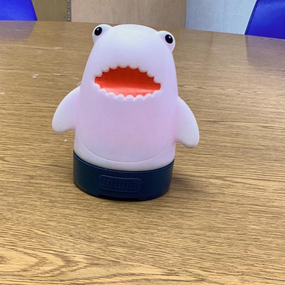 A glow in the dark shark lamp for kids